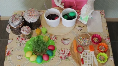 The girl paints Easter eggs Stock Footage 76643493
