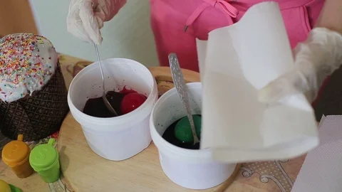 The girl paints Easter eggs Video stock 76649335