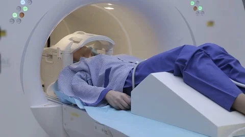 Girl patient during the study using magnetic resonance imaging Stock Footage 95935031