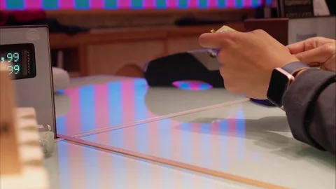 Girl pays the order in the store. Hands close up Stock Footage