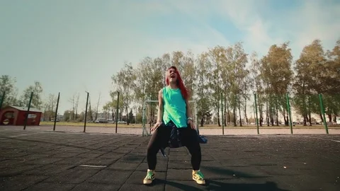 The girl performs a cool dance. The concept of teaching hip hop and break Stock Footage