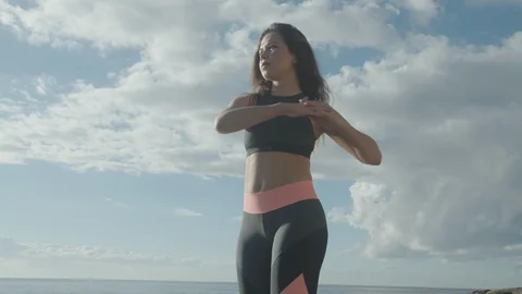 Girl performs stretch exercises. Pre-workout stretches. Morning exercise Stock Footage 108373403