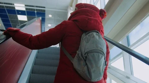Girl picks up the escalator Stock Footage 101782851