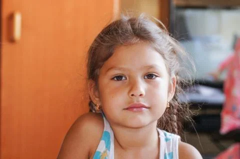 Girl with pigtails posing for the camera Stock Photos