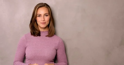 Girl in pink pointing Video stock 80252875