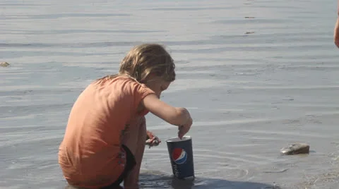 Girl playing on beach Stock Footage 27063188