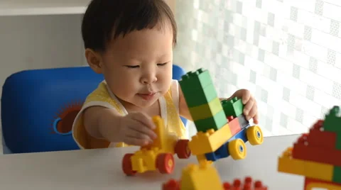 Girl playing blocks Stock Footage 45911792