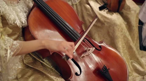 Girl playing with cello Stock Footage 67034565