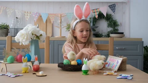 Girl Playing with Chicks on Kitchen at Easter Stock-Footage 168113518