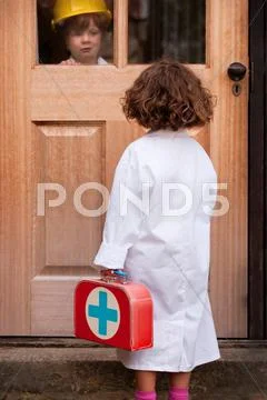 Girl Playing Doctor Making House Call