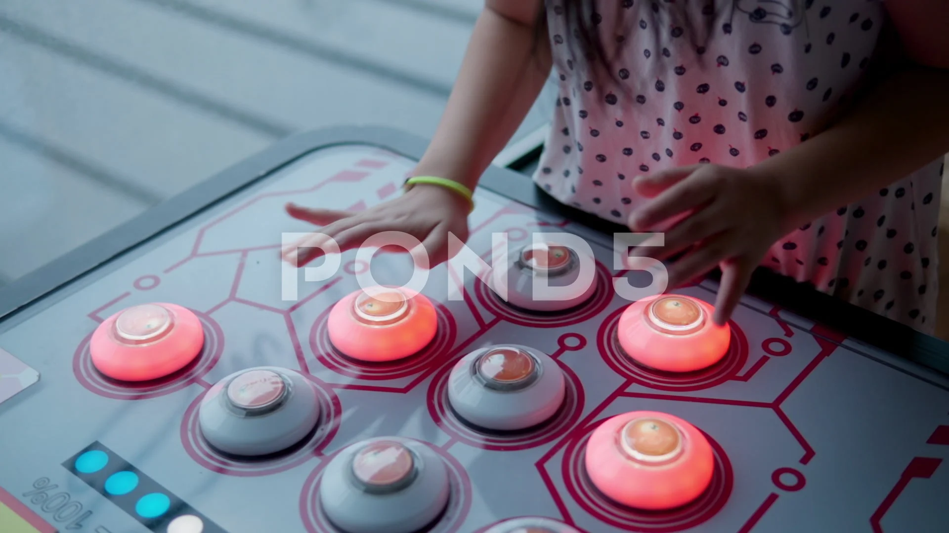 Girl Playing Game on Arcade Naughty Bean Machine. Young Kid Enjoy