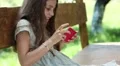 Girl playing the game on his smartphone HD Footage
