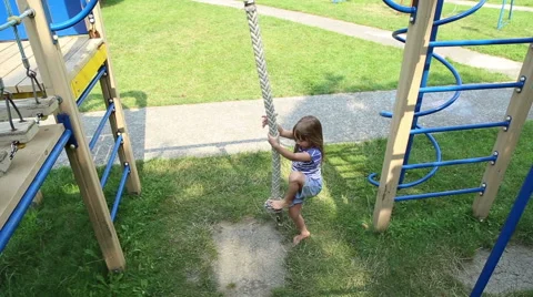 Girl playing on the playground Stock Footage 52431240
