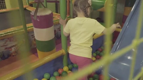 The girl is playing on the playground Stock-Footage 81456237