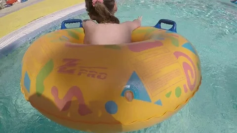 Girl playing in the pool Stock Footage 72496988