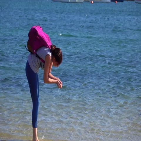 Girl Playing With  Seashell Video stock 69589235