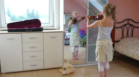 Girl is playing viola Stock Footage 65074197