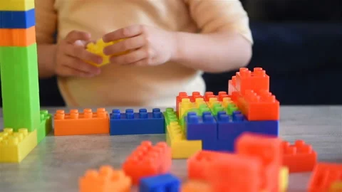 Girl Plays Constructor On Desk. Stock Footage 168173004