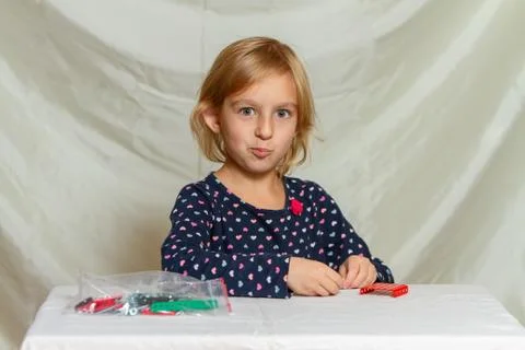 Girl plays constructor Stock Photos