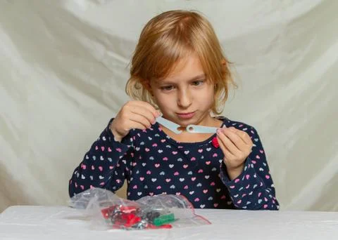Girl plays constructor Stock Photos