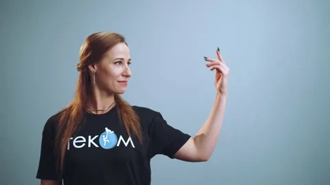 The girl points to an empty area Stock Footage 211039332