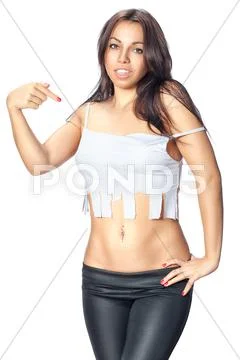 Girl points to his shirt where you can write Stock Photos