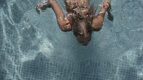 Girl in the pool Stock Footage 49025117