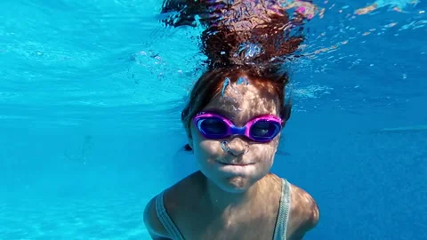 Girl in pool Stock Footage 152530390