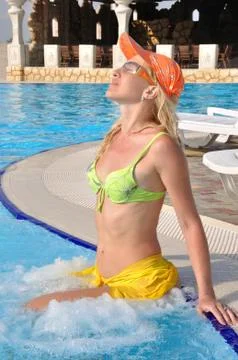 Girl in the pool Stock Photos