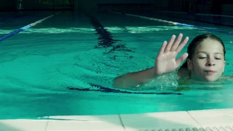 Girl in the pool in slow motion Stock Footage 81923039