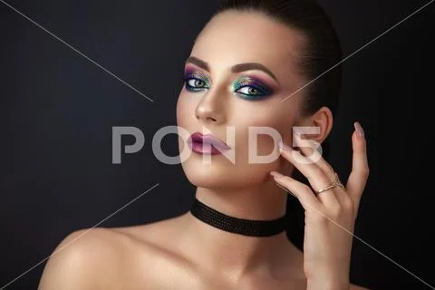 Girl portrait make-up dark background. Stock Photos