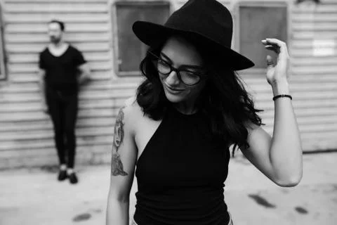 Girl posing against background of a wall Stock Photos