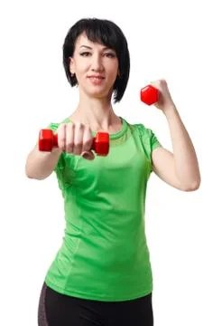 Girl posing with dumbbells in studio, isolate on white background, sport and  Stock Photos