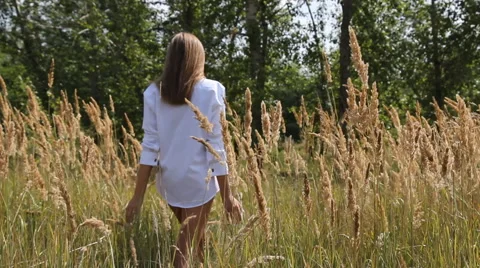 Girl posing in a hat outdoors Stock Footage 66769342