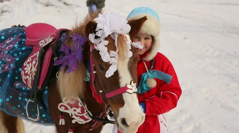 Girl posing with a horse Stock Footage 44398564