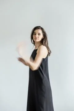 Girl posing in motion in studio 스톡 사진