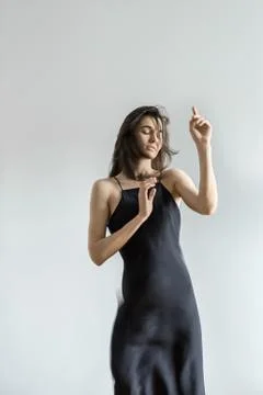 Girl posing in motion in studio Stock-Fotos