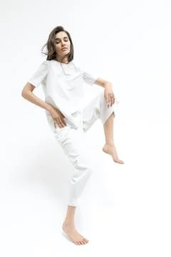 Girl posing in motion in studio Stock-Fotos