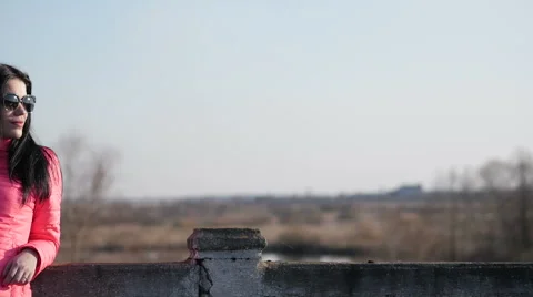 Girl posing on the old bridge Stock Footage 61805354