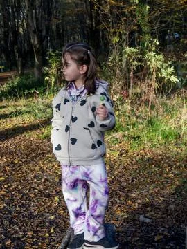 Girl posing in the park Stock Photos