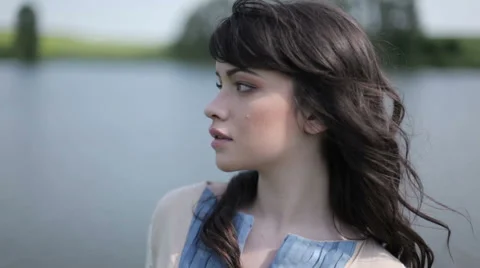 Girl posing at the river.(FLAT COLOR) Stock Footage 47988075