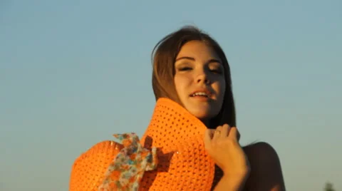 Girl posing on the shore in a hat Stock Footage 66724825