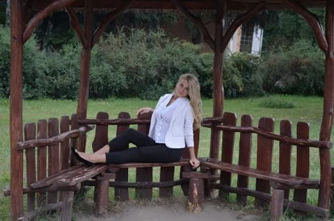 Girl posing sitting Stock Photos