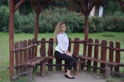 Girl posing sitting Stock Photos