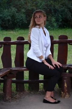 Girl posing sitting Stock Photos