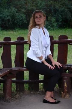 Girl posing sitting Stock Photos