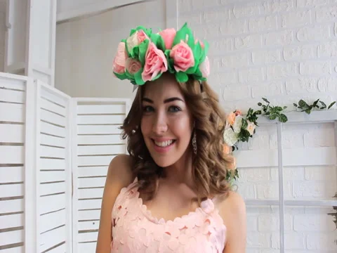 Girl posing in the Studio with flower Stock Footage 83449528