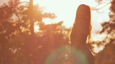 Girl posing in sun backlit Video stock 63930333