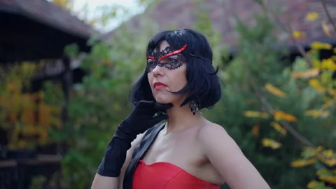 Girl posing in a vamp mask Stock Footage 150450643