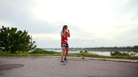 Girl practicing kickboxing Stock Footage 110842226